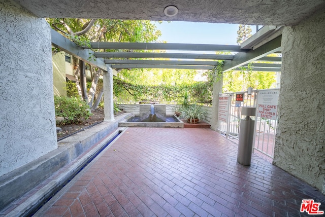 view of patio / terrace featuring a pergola