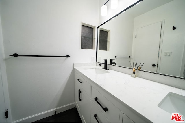 bathroom with vanity and tile patterned floors