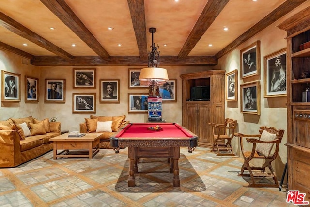 game room with pool table and beam ceiling