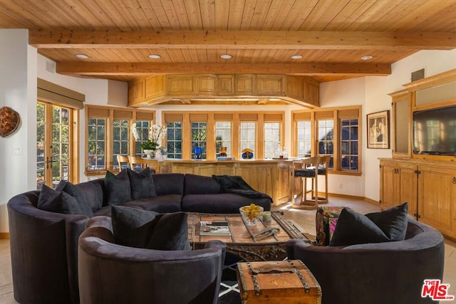 living room featuring beamed ceiling and wooden ceiling