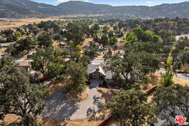 drone / aerial view featuring a mountain view