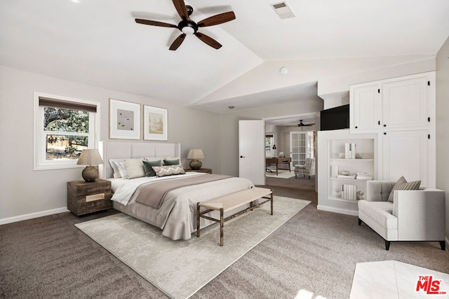 carpeted bedroom featuring ceiling fan and vaulted ceiling