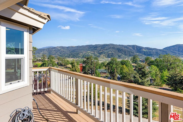 exterior space featuring a mountain view