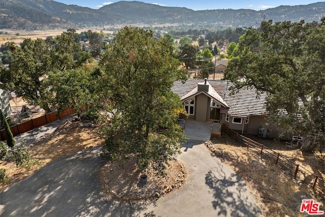 drone / aerial view featuring a mountain view