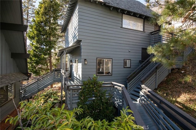 rear view of house with a deck