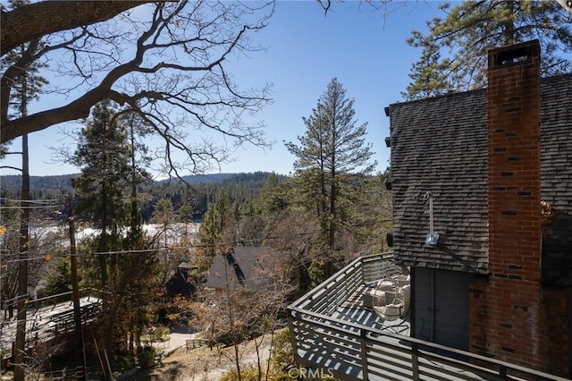 view of property exterior featuring a balcony