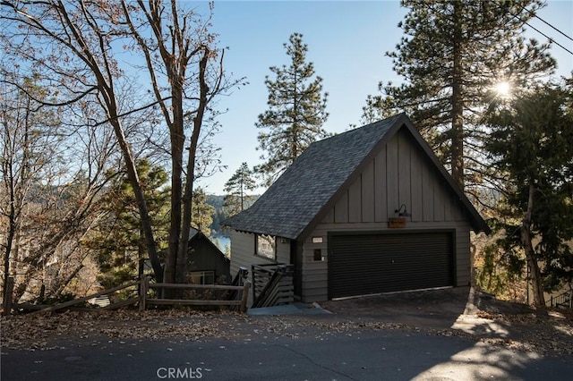 view of front of property with an outbuilding and a garage