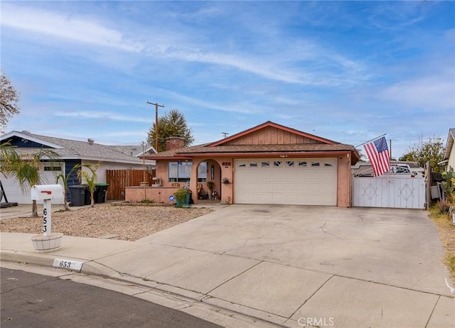 ranch-style home with a garage