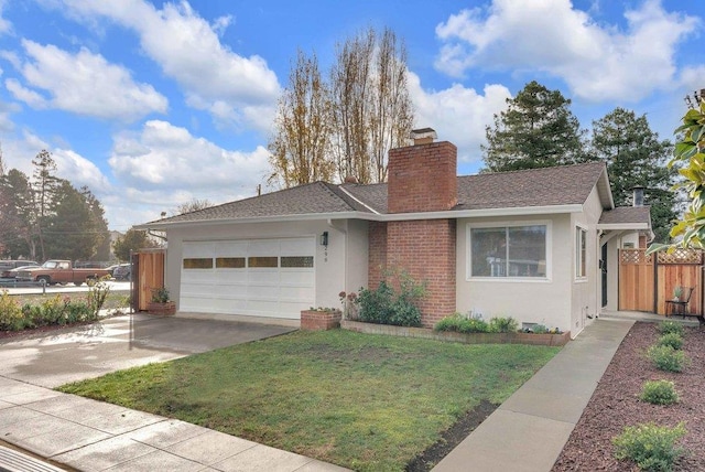 view of front facade with a front lawn and a garage