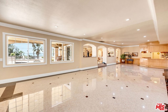 interior space with crown molding