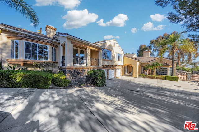 view of front of home with a garage