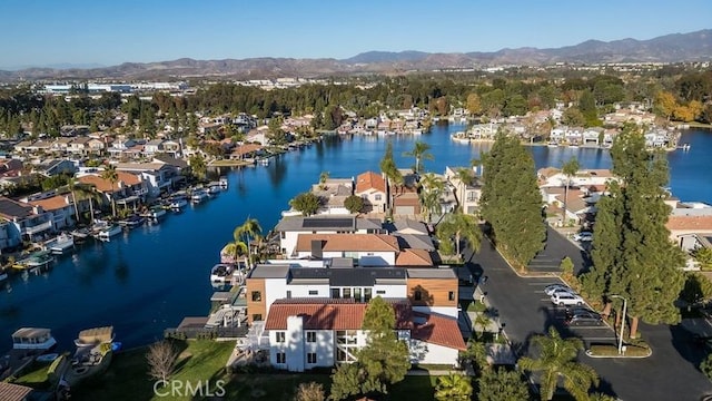 bird's eye view featuring a water and mountain view