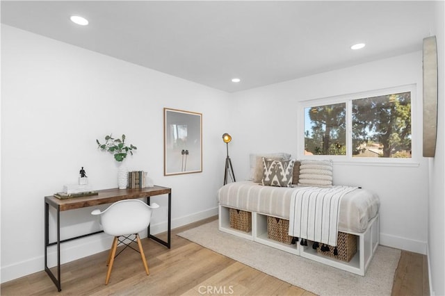 bedroom with hardwood / wood-style flooring