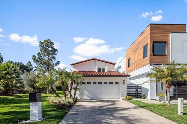 view of front facade featuring a garage and a front yard