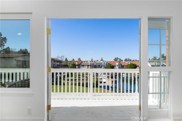 doorway to outside with plenty of natural light