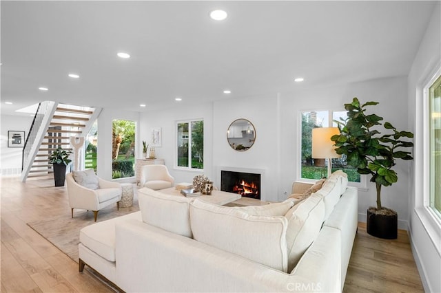 living room with light hardwood / wood-style floors