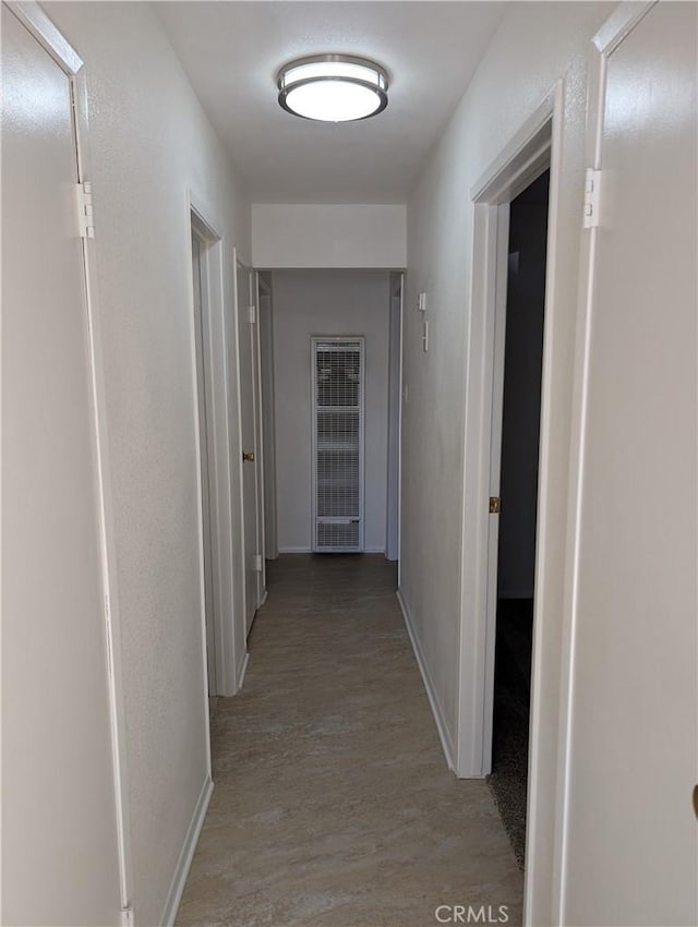 hall with light wood-type flooring