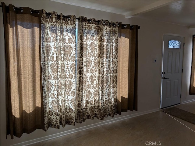 foyer with beam ceiling