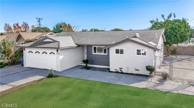 ranch-style home featuring a garage and a front lawn