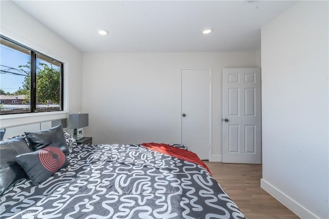 bedroom featuring light hardwood / wood-style floors