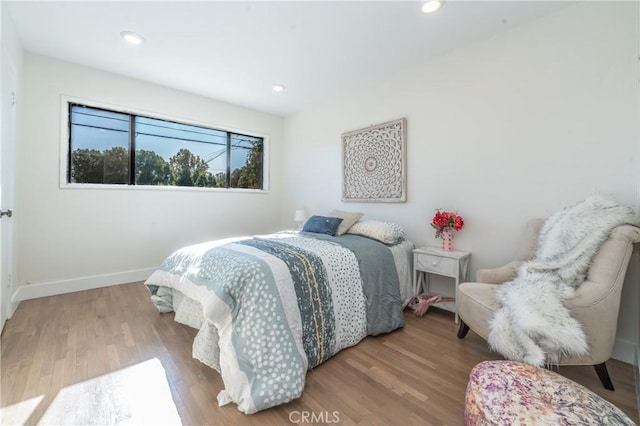 bedroom featuring hardwood / wood-style floors