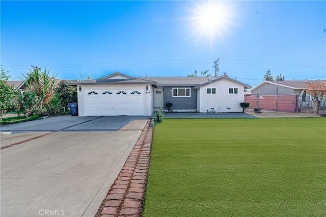 ranch-style house featuring a garage and a front yard