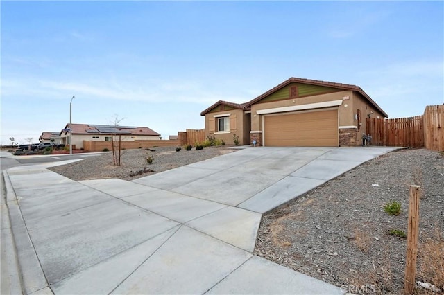 single story home with a garage