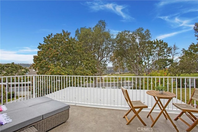 view of patio / terrace with a balcony