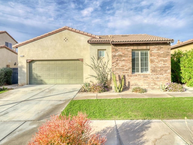 mediterranean / spanish-style house featuring a garage