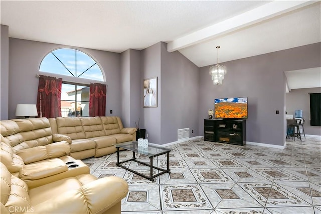 tiled living room featuring a chandelier and lofted ceiling with beams