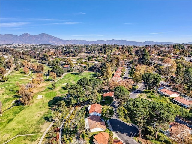 birds eye view of property with a mountain view