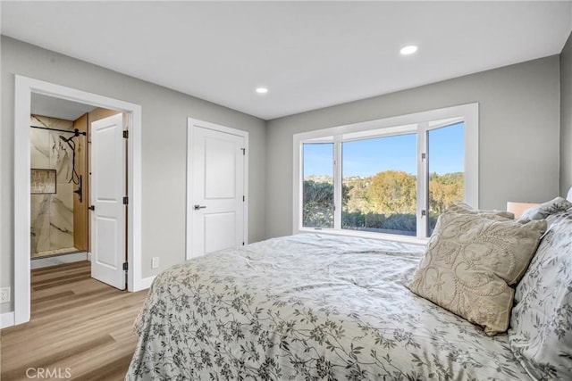 bedroom featuring light wood-type flooring