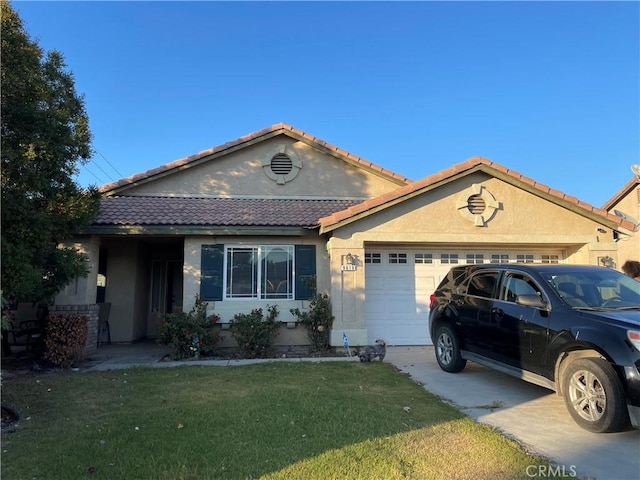 ranch-style home with a garage and a front lawn