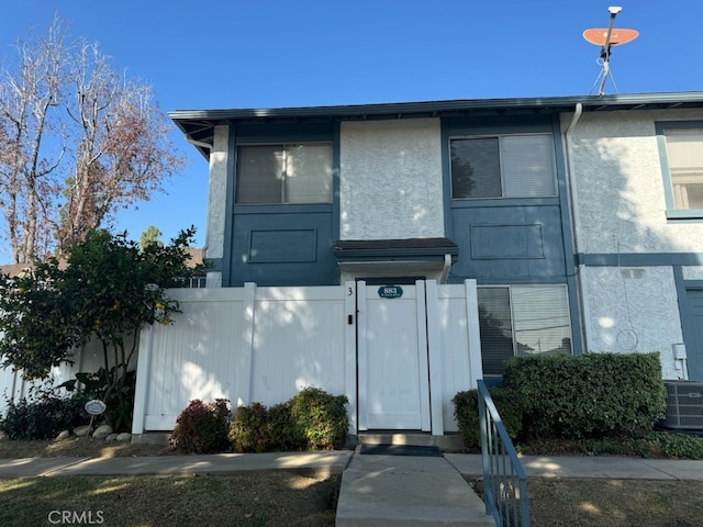 view of front of house with central AC unit