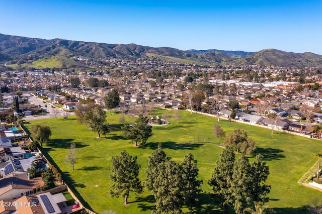 drone / aerial view featuring a mountain view