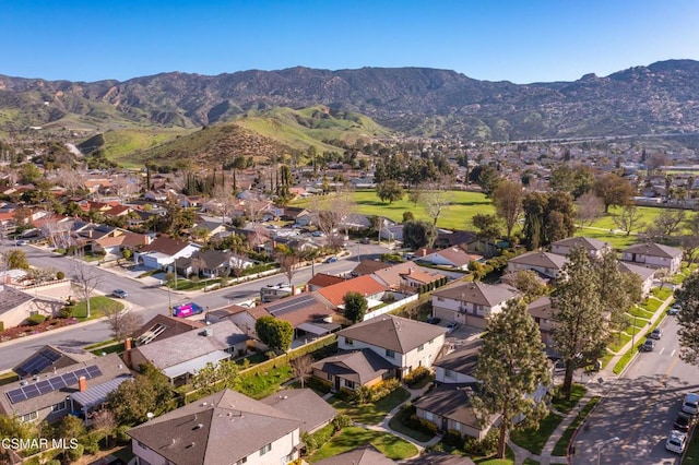 drone / aerial view featuring a mountain view