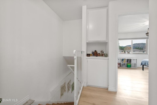 hallway featuring light hardwood / wood-style floors