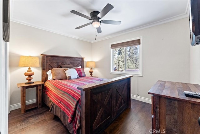 bedroom with ornamental molding, ceiling fan, and dark wood-type flooring