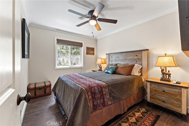 bedroom featuring crown molding, ceiling fan, and dark wood-type flooring