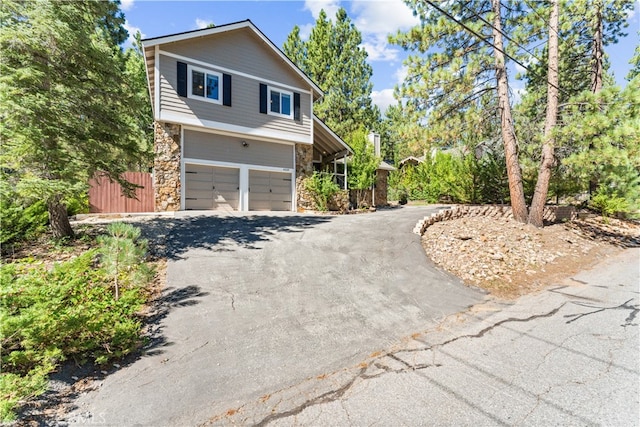 view of side of property featuring a garage