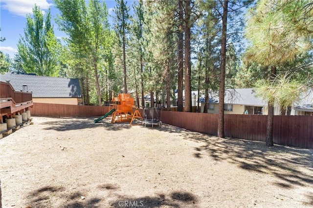 view of yard featuring a playground