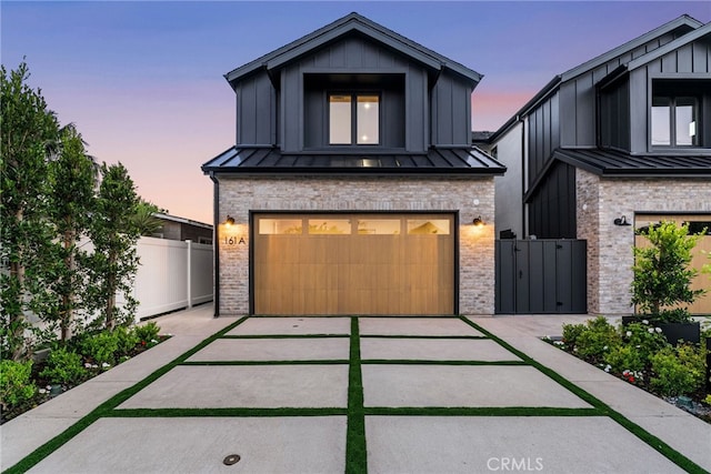 view of front of house with a garage