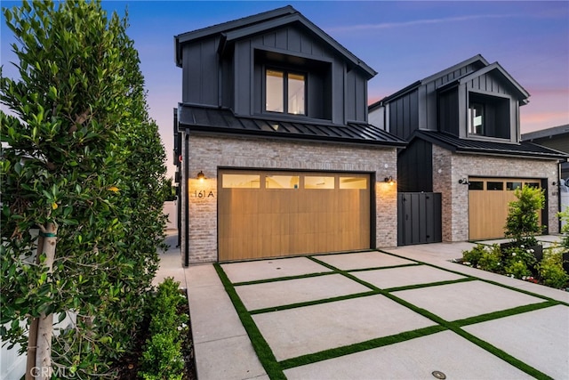 view of front of property featuring a garage