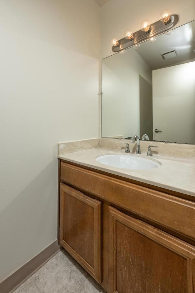 bathroom featuring vanity and tile patterned floors