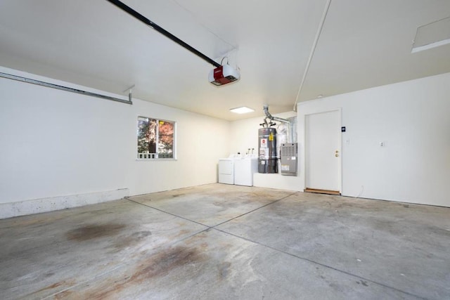 garage with electric panel, a garage door opener, separate washer and dryer, and secured water heater