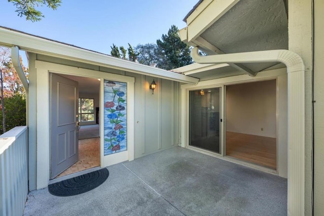 doorway to property with a patio