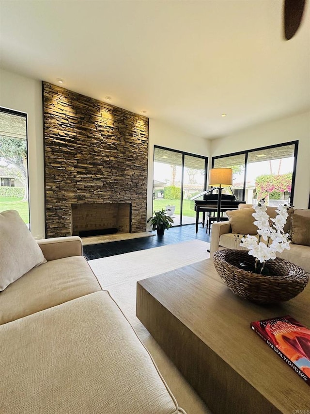 living area featuring a fireplace