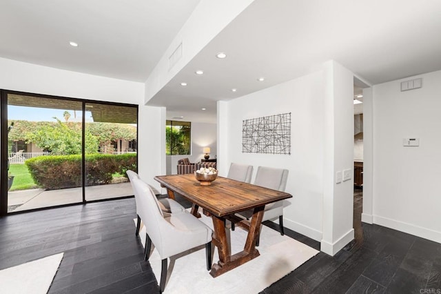 dining room featuring visible vents, recessed lighting, baseboards, and wood finished floors