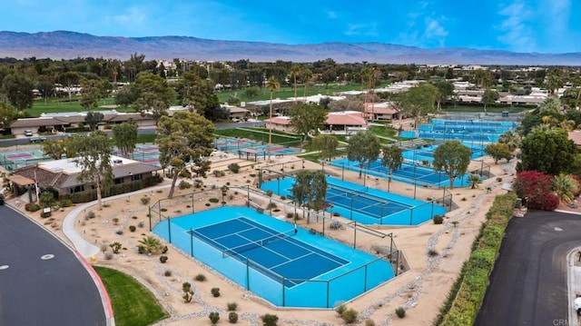 birds eye view of property featuring a mountain view