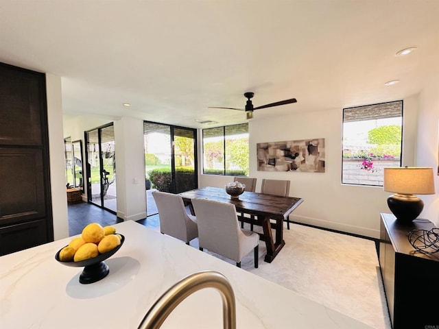 dining space featuring recessed lighting, baseboards, ceiling fan, and wood finished floors